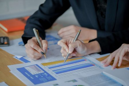 financial-audit-team-is-checking-the-numerical-graph-to-present-.jpg